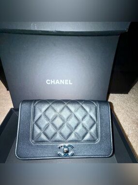 CHANEL Charcoal Quilted Leather Mini Bag with CC Turn-Lock and Adjustable Strap